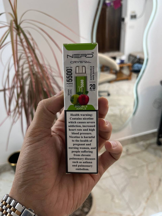 پاد نِرد کریستال 5500 پاف Nerd Crystal – طعم دوسیب، کوکاکولا یخ و بلوبری یخ | ویپ طعم دوسیب